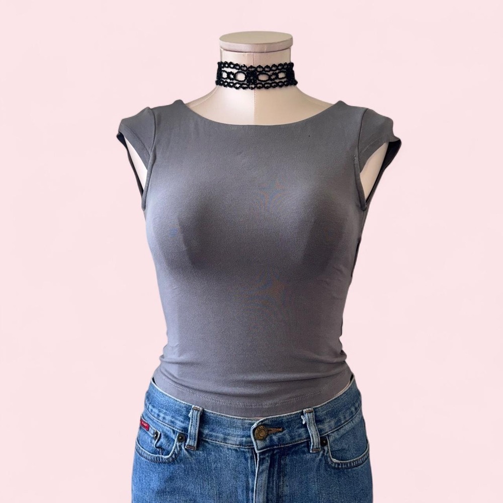 Fitted‎ grey stretch top with unique shoulder cutout details and cap sleeves